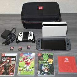Nintedo Switch OLED bundle with 6 Games, extra controllers and more!