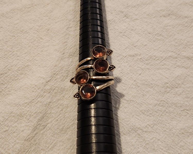 NEW Sterling Silver Adjustable Ring with Purple Rhinestones. Bundle to save on shipping! Please message me before leaving anything less than a 5-S