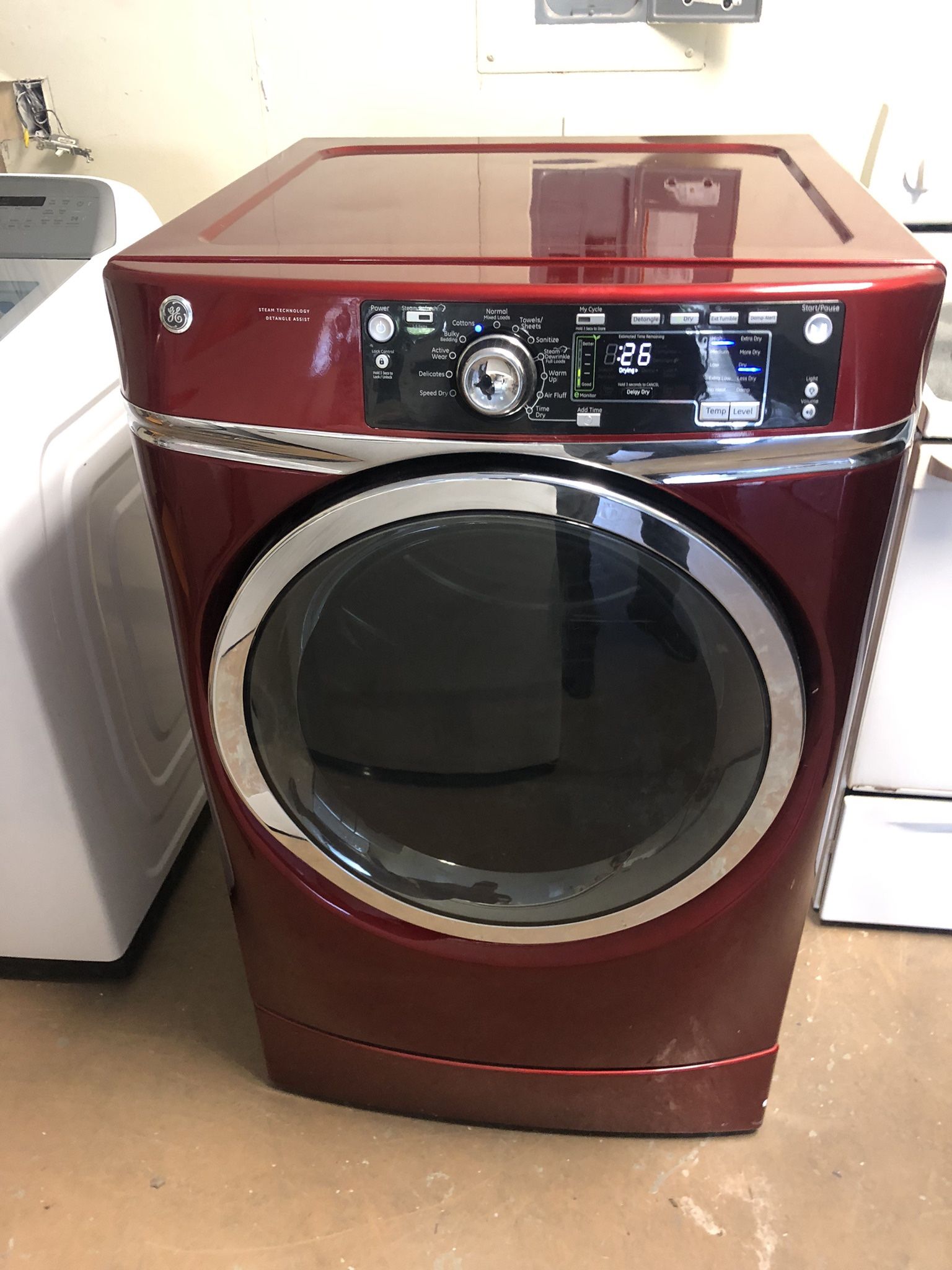 Red GE Electric Dryer On pedestal