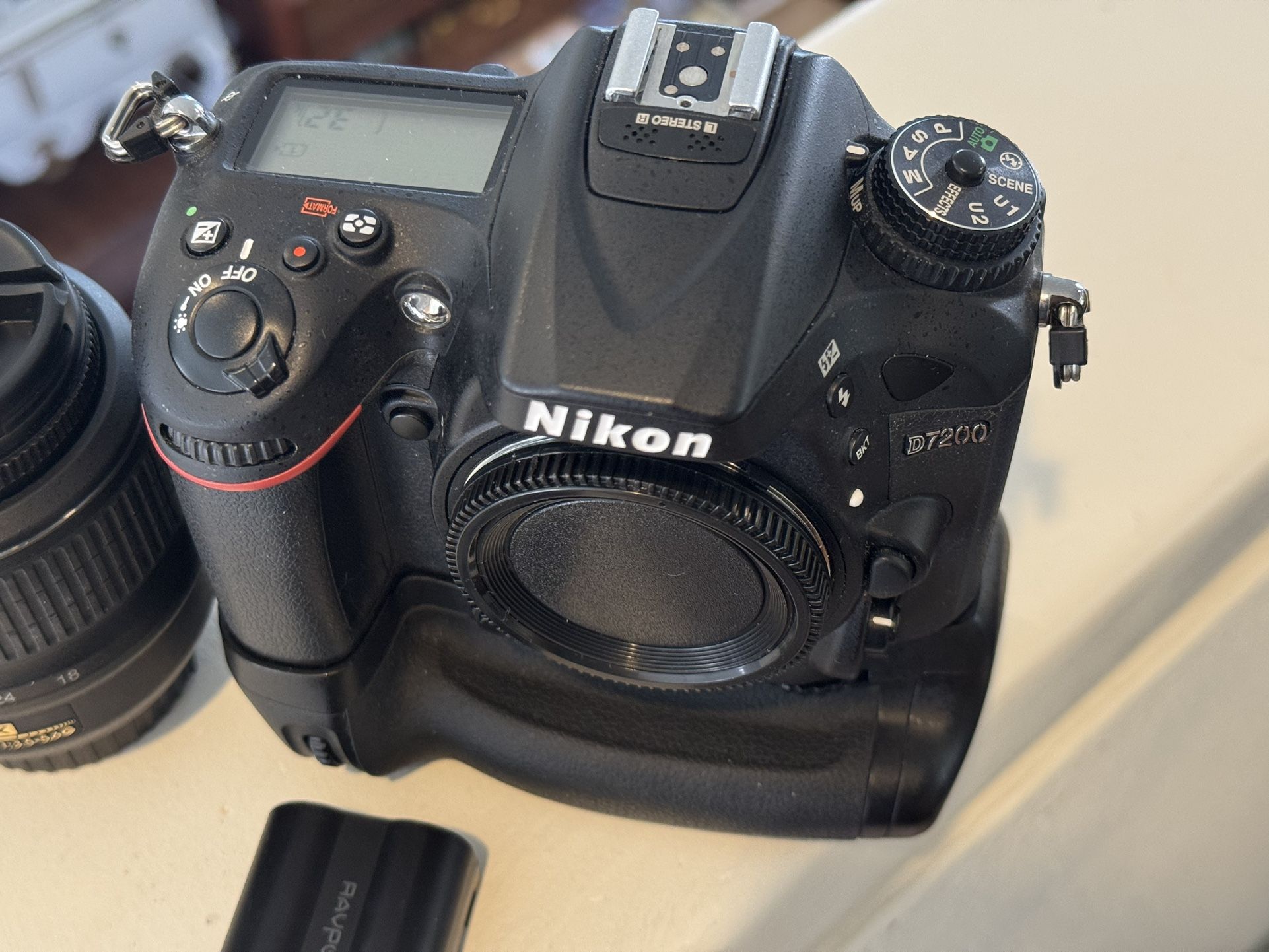 Nikon D7200 + 18-55mm lens + extras