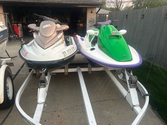 2 jet skis and trailer