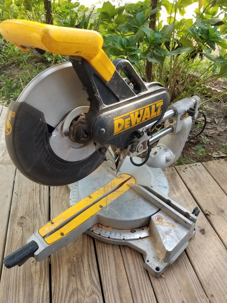 Hi,I'm Looking to Buy Broken Or For Parts Dewalt Miter saw,,,,,,,, Dis Saw Is Not for Sale.
