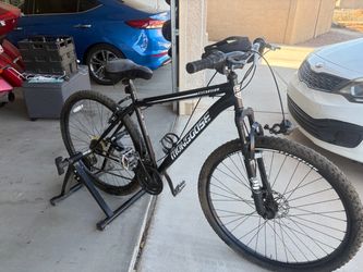 29in Mingoose 27speed bike with trainer stand