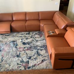 New 7 PC/4 PWR Reclining Sectional.  Genuine Italian Leather.  Camel.  123” X 138”.  Free Delivery!