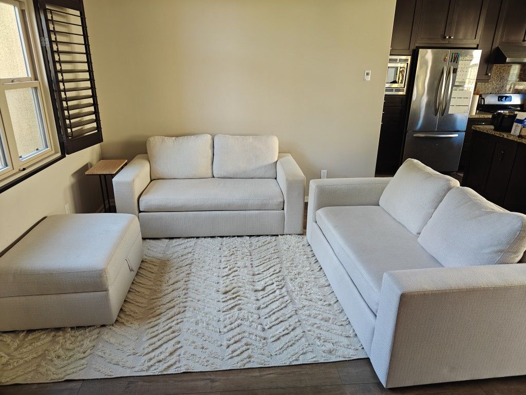 2 Sofas 84" incl. storage ottoman in cream