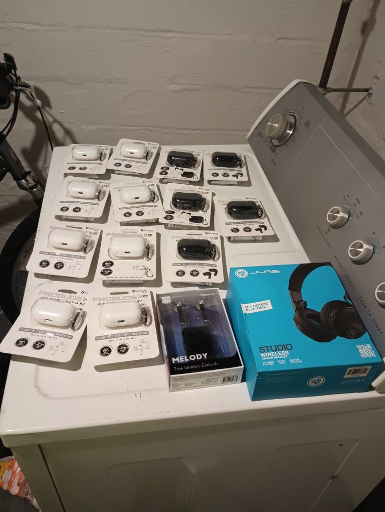 13 pairs of Probuds V2 Bluetooth Earbuds, 1 pair of Melody Bluetooth Earbuds and 1 pair of over the ear JLab Bluetooth Headphones