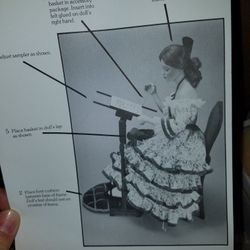 "Sampler" porcelain doll