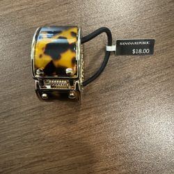 Banana Republic decorative tortoise shell hair tie with a gold-tone cuff 