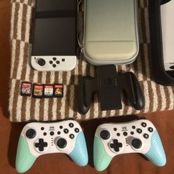 Nintendo Switch OLED with Joy Con + Games