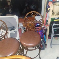 Kitchen table and chairs and 2 stools