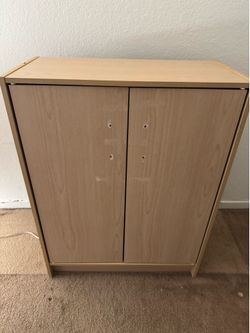Light oak storage cabinet