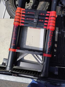 Telescoping extension ladder