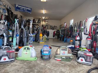 Portable handheld upholstery cleaners