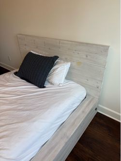 Full size mattress and bed frame.