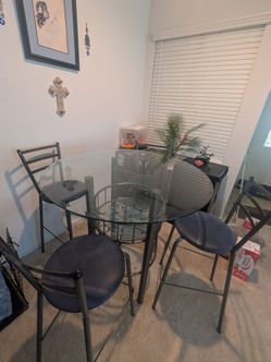 Glass top high table with four high chairs