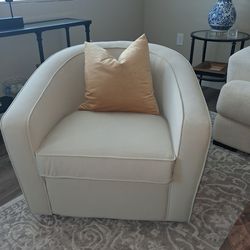 Set of two (2) brand New swivel chairs from Living Spaces