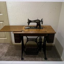 Antique Singer Sewing machine with cabinet