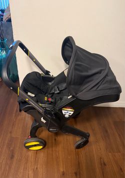 Doona car seat/stroller with base