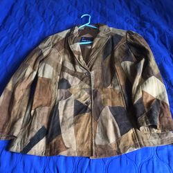 Patched lady’s leather jacket.