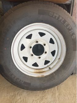 Trailer spare rim and tire