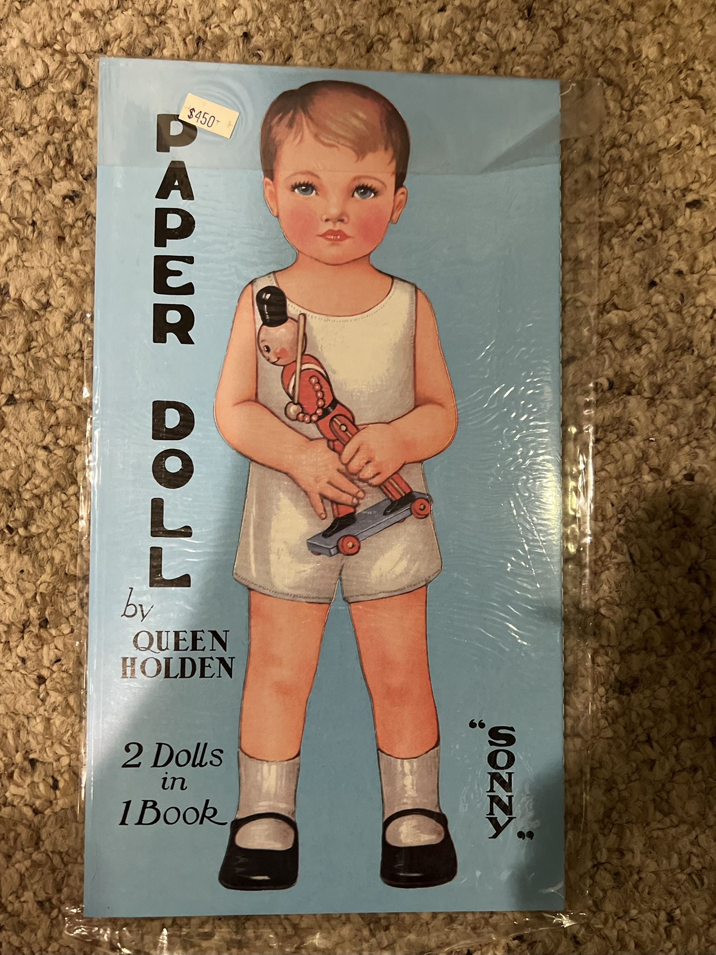 New in sealed package Queen Holden paper dolls 2 dolls in 1 book