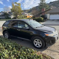 Black 2011 Ford Edge SUV with 122,005 miles