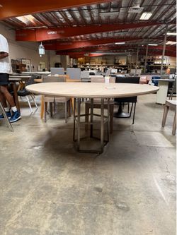 60” round dining room table with wood top and metal base