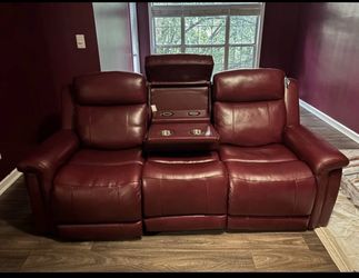 Burgundy leatherette Love seat w/ charging port