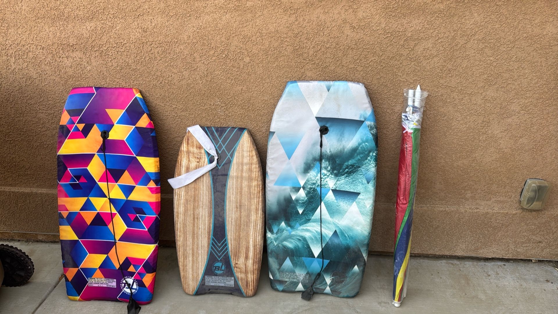 Three Boogie Boards Plus Beach Umbrella