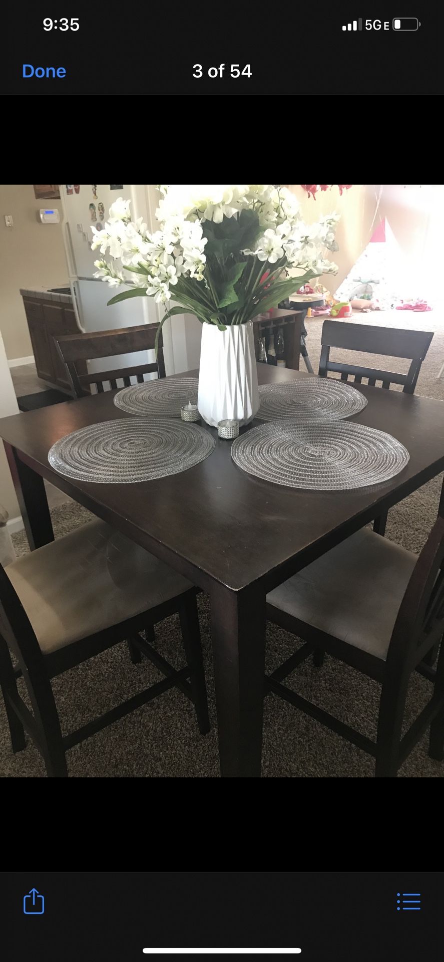 Dark brown pub table and 4 chairs