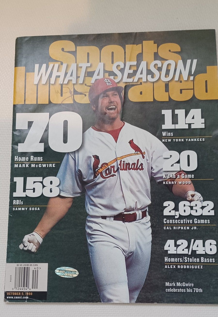 1998 SPORTS ILLUSTRATED AUTOGRAPHED BY MARK MAGUIRE COMES WITH COA