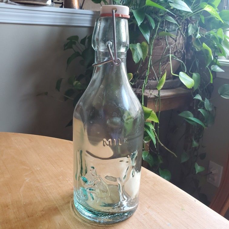 Vintage Glass Milk Bottle with Lid, Man Milking Cow
