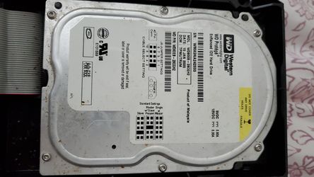 Original xbox hard drive with casing and ribbon.