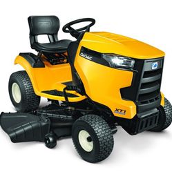 Garage Kept Cub Cadet 42" Riding Mower. Great Condition.Just Serviced, New Blades, New Battery 