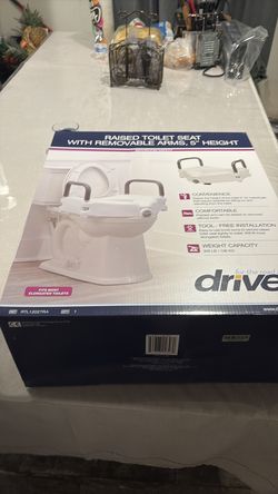 Raised toilet seat