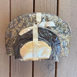  Traver three-piece dome travel set in a black and gold damask pattern