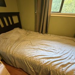 Twin Bed With Mattress.  In Great Condition 