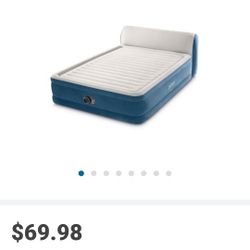 New factory sealed Queen size inflatable mattress w/ carrying bag, headboard and internal pump. 