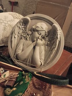 Thoughts  of an angel sculptural wall round