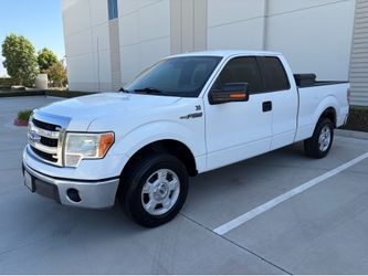 2014 ford f150 XLT 4 door V6 cold a/c runs great clean title.