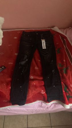 Purple jeans size 30 for $50