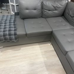 $150 - Dark Grey Sectional / Faux leather With Scratches 