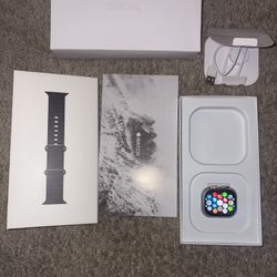 Apple Watch Ultra 3 GPS + Cellular, 49mm Black Titanium Case with An Black Ocean And Orange Band