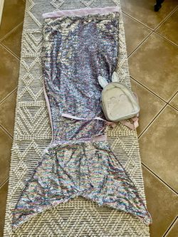 Justice mermaid sequin blanket and justice mini backpack.   