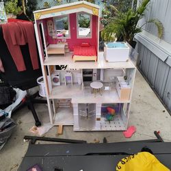 Doll House 4 Ft Tall  Has Stove Frege Bed And Much More
