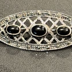 Vintage Art Deco 925 Sterling Silver Onyx & Marcasite Brooch Pin.  Vintage estate signed 925. Marcasite stones, onyx stone center. Sterling silver est
