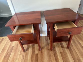 Set of wooden end tables with drawers