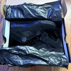 Black Cat Jordan 4s