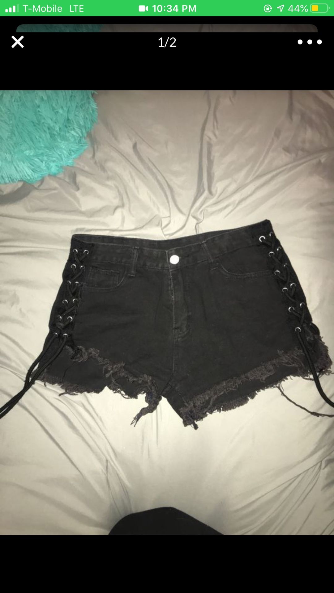 Laced up ripped shorts denim