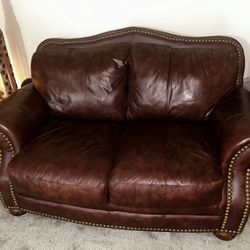red leather couches , love seat & single seat 